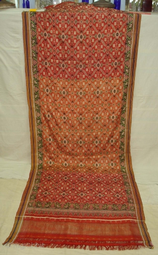 Patola Sari Silk Double ikat.Probably Patan Gujarat. India. this Patola sari has the type of geometric,non figurative pattern particularly favored by the ismaili Muslim merchant community of the Vohras.And its called Vohra-Gaji-Bhat.(Vohra  ...