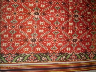 Patola Sari Silk Double ikat.Probably Patan Gujarat. India. this Patola sari has the type of geometric,non figurative pattern particularly favored by the ismaili Muslim merchant community of the Vohras.And its called Vohra-Gaji-Bhat.(Vohra  ...