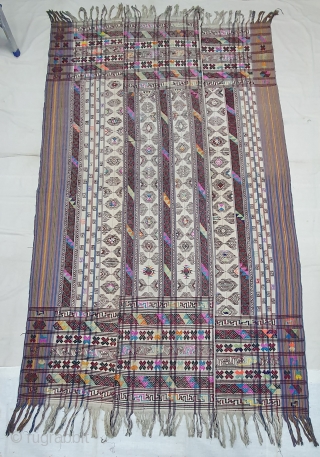 Kira (woman's wrap),Probably woven in Bumthang, Bhutan. It consists of three panels joint to form one single cloth. The delicate weaving n patterning consists of motifs that are popular in other textiles  ...