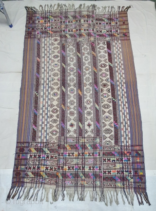 Kira (woman's wrap),Probably woven in Bumthang, Bhutan. It consists of three panels joint to form one single cloth. The delicate weaving n patterning consists of motifs that are popular in other textiles  ...