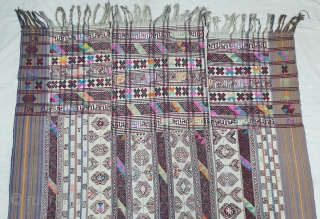 Kira (woman's wrap),Probably woven in Bumthang, Bhutan. It consists of three panels joint to form one single cloth. The delicate weaving n patterning consists of motifs that are popular in other textiles  ...