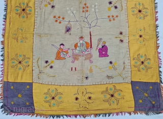 Guru Nanak Rumal Embroidery on Gajji-silk, Figures are showing of Guru Nanak and companions Bhai Mardana and Balla, Its used to cover Guru Granth Sahib.From Punjab India. 

C.1900.

Its size is 105cmX105cm (20220610_173600). 