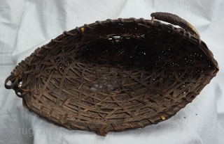 Hat, Naga People, Kalyo-Kengyu ethnics group, Northeastern India.
Cane, A red-dyed woven cane conical-shaped warrior's interwoven in typical fashion. There may have been a boar's tusk attached to the front.
Early to mid-20th century.
Its  ...