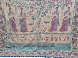 An Roller Print Pichwai depicting the Lord in the form of a tree with abundance and life. It's flanked by Gopis on both sides venerating the divine and the lower register shows  ...