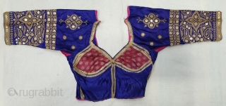 Real Zari Embroidery Backless Choli from Saurashtra Region of Gujarat. India. Circa 1900. Belongs to Royal Rajput Community.Fine real silver thread (Gold Plated) embroidery on the satin silk(20190629_145210).     