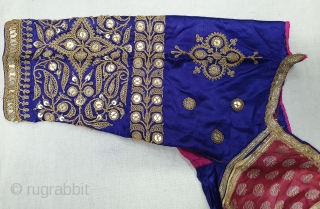 Real Zari Embroidery Backless Choli from Saurashtra Region of Gujarat. India. Circa 1900. Belongs to Royal Rajput Community.Fine real silver thread (Gold Plated) embroidery on the satin silk(20190629_145210).     