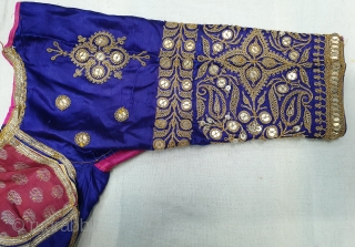 Real Zari Embroidery Backless Choli from Saurashtra Region of Gujarat. India. Circa 1900. Belongs to Royal Rajput Community.Fine real silver thread (Gold Plated) embroidery on the satin silk(20190629_145210).     