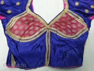 Real Zari Embroidery Backless Choli from Saurashtra Region of Gujarat. India. Circa 1900. Belongs to Royal Rajput Community.Fine real silver thread (Gold Plated) embroidery on the satin silk(20190629_145210).     