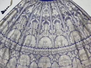 Wedding Lehenga  (Skirt) Zari (Real Silver) Brocade From Varanasi,  Uttar Pradesh. India.Known As Marwadi Lehenga. its  has  Fourteen KaliThe lehenga is fashioned from silk and real gold-polished silver zari. The silk is a deep  ...