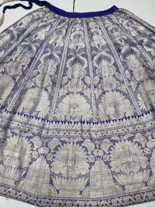 Wedding Lehenga  (Skirt) Zari (Real Silver) Brocade From Varanasi,  Uttar Pradesh. India.Known As Marwadi Lehenga. its  has  Fourteen KaliThe lehenga is fashioned from silk and real gold-polished silver zari. The silk is a deep  ...