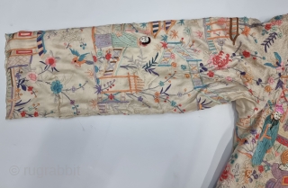 An Unique Chinese Art Embroidered Coat with lavish pastel hand embroidered Chinese Monk, Ladies, Monastery with  Gardens , Trees and birds amidst deep foliate patterns throughout. 2 button coat style with  ...