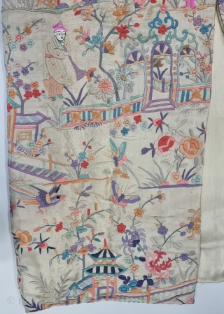 An Unique Chinese Art Embroidered Coat with lavish pastel hand embroidered Chinese Monk, Ladies, Monastery with  Gardens , Trees and birds amidst deep foliate patterns throughout. 2 button coat style with  ...