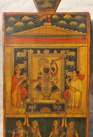 Worship of Shrinathji with Gopashthami pichhavai. Painting on wooden panel. Late 19th -early 20th century. Nathdwara. Rajasthan, India.
This was most likely the lid of a wooden box which contained the deity’s jewellery  ...