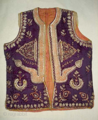 Man’s waistcoat(Sadri/Bandi)From Hyderabad,South India.Cotton velvet,embroidered with silver and gold-wrapped thread,L 51cm x w 41cm.Condition is worn from back side(DSC06336 New).             