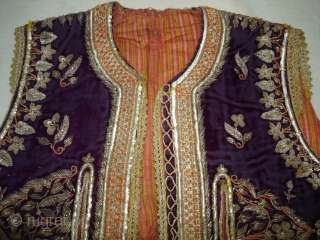 Man’s waistcoat(Sadri/Bandi)From Hyderabad,South India.Cotton velvet,embroidered with silver and gold-wrapped thread,L 51cm x w 41cm.Condition is worn from back side(DSC06336 New).             