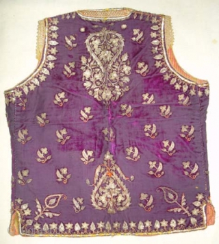 Man’s waistcoat(Sadri/Bandi)From Hyderabad,South India.Cotton velvet,embroidered with silver and gold-wrapped thread,L 51cm x w 41cm.Condition is worn from back side(DSC06336 New).             