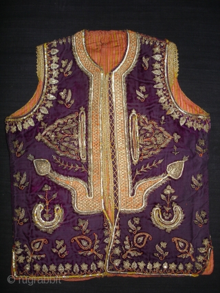 Man’s waistcoat(Sadri/Bandi)From Hyderabad,South India.Cotton velvet,embroidered with silver and gold-wrapped thread,L 51cm x w 41cm.Condition is worn from back side(DSC06336 New).             