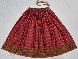 An very Rare Mochi Bharat Embroidery With Ikat Mashru Ghaghra Skirt , This Mashru weaving was done in the Mandvi Kutch Region Of Gujarat, North-West India,Its  Wave Design Silk And Cotton Ikat  ...