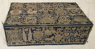 A Very Rare and Unique Jain Kalpasutra Manuscript Book Cover with exquisite real zari embroidery, from Kutch, Gujarat, India.
This exceptional embroidered manuscript cover depicts the sacred story of the birth of Lord ...