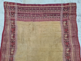 Patola Sari,Silk Double Ikat.Probably Patan Gujarat. India.
This Patola Uses one of the most Rare designs known as Panetar Yellow Patola, 
It belongs to Nagar Brahmin Group of Gujarat India.

C.1825-1850.

Its size is 12cmX290cm(20210804_161933).
 