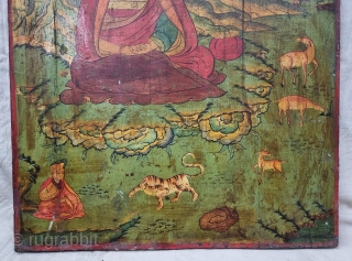 Dramatically Tibetan Buddhist Hand Painted Wood Panel

depicting symbols of Tibetan mythology such as Tigers Dragons and Lamas From Tibet.

C.1875-1900.

Its size is 67cmX90cm (20220802_164202).          