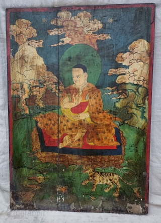 Dramatically Tibetan Buddhist Hand Painted Wood Panel

depicting symbols of Tibetan mythology such as Tigers Dragons and Lamas From Tibet.

C.1875-1900.

Its size is 56cmX81cm (20220802_164351).          