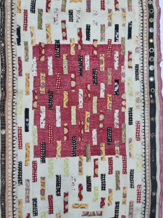 Baby Quilt Appliqued and Embroidered Quilt Applique with colourful chintz on several layers of hand spun hand woven cotton base with silk and cotton threads embroidery with mirrors.

Made by the Gadhvi (charan)  ...