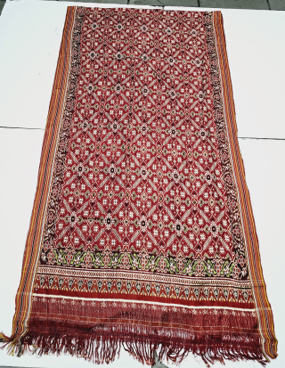 Patola Sari Silk Double ikat.Probably Patan Gujarat. India.

This Patola sari has the type of geometric,non figurative pattern particularly favored by the ismaili Muslim merchant community of the Vohras.And its called Vohra-Gaji-Bhat.(Vohra Type  ...