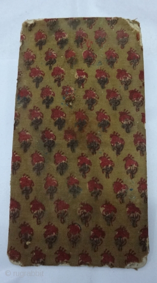 Sutra Book Cover, Wood block Print on cotton textile, On the Green-Indigo base colour with flower design,From Rajasthan. India.Circa 1900.Its size is 11cmx21cm(DSC04866).
          