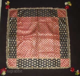 Zari (Real Zari) Brocade Khinkhab Chakla (Wall Hanging) from Jamnagar Gujarat, India. Beautiful Indigo side Brocade border with Maroon Brocade work in the middle with Manchester Print backing C.1900.Its size is 85cmX85cm(DSC06707). 