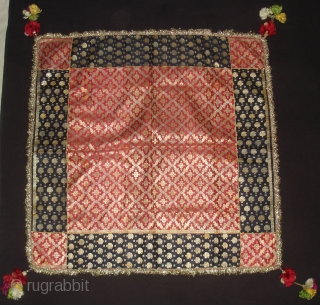 Zari (Real Zari) Brocade Khinkhab Chakla (Wall Hanging) from Jamnagar Gujarat, India. Beautiful Indigo side Brocade border with Maroon Brocade work in the middle with Manchester Print backing C.1900.Its size is 85cmX85cm(DSC06707). 