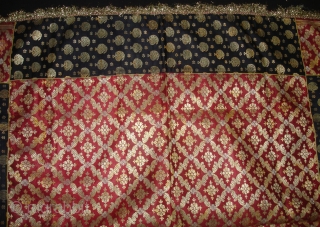 Zari (Real Zari) Brocade Khinkhab Chakla (Wall Hanging) from Jamnagar Gujarat, India. Beautiful Indigo side Brocade border with Maroon Brocade work in the middle with Manchester Print backing C.1900.Its size is 85cmX85cm(DSC06707). 