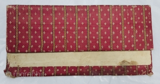 Mashru Book Cover with Manchester ticket inside,silk warps,cotton wefts,warp ikat,satin weave Mashru from Kutch, Gujarat.India.C.1900.Its size is 14cmX28cm. very rare kind of Mashru (174349).         