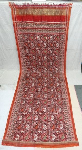 Nari Kunj Patola Saree, Silk Double Ikat, Probably Patan Gujarat. India.This Patola uses one of the rarest designs, known as Nari Kunj Patola. This Patola is showing Nari Kunjar Bhat, Popat Kunjar  ...