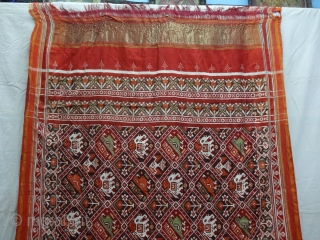 Nari Kunj Patola Saree, Silk Double Ikat, Probably Patan Gujarat. India.This Patola uses one of the rarest designs, known as Nari Kunj Patola. This Patola is showing Nari Kunjar Bhat, Popat Kunjar  ...