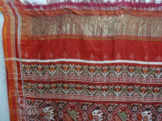 Nari Kunj Patola Saree, Silk Double Ikat, Probably Patan Gujarat. India.This Patola uses one of the rarest designs, known as Nari Kunj Patola. This Patola is showing Nari Kunjar Bhat, Popat Kunjar  ...