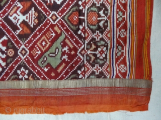 Nari Kunj Patola Saree, Silk Double Ikat, Probably Patan Gujarat. India.This Patola uses one of the rarest designs, known as Nari Kunj Patola. This Patola is showing Nari Kunjar Bhat, Popat Kunjar  ...