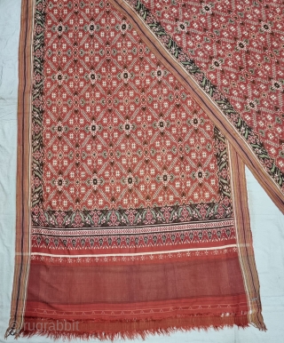 Patola Sari Silk Double ikat.Probably Patan Gujarat. India.

This Patola sari has the type of geometric,non figurative pattern particularly favored by the ismaili Muslim merchant community of the Vohras.And its called Vohra-Gaji-Bhat.(Vohra Type  ...