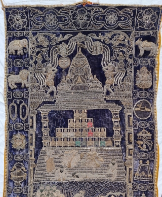 A Rare Jain Temple Hanging, From Gujarat in Northwest India. India

Its size is 77cmX132cm.

Weight is 2 Kgs 090 Gm

C.1900.- 1945.

This form of embroidery is called zardosi work. A Indigo Blue  velvet cloth has been  ...