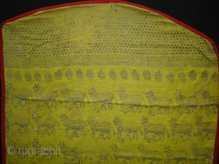 Pichwai for the Gopashtami From Gujarat India.Silver-tinsel Stamped with gum on yellow muslin cotton.Circa 1900.Its size is 82cmX100cm(DSC01463).               