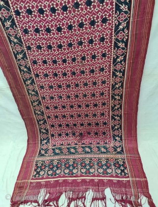 An Rare Tran-phul-bhat Patola Sari,Silk Double Ikat.Probably Patan Gujarat.This Patola known as Tran-phul-bhat(there flowers design).This Patola is one of the most Rare designs and in indigo blue colour.

C.1825-1850.

Its size is 100cm x  ...