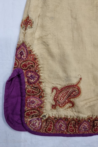 A Kashmir Embroidery Jacket-Waist Coat, Borders with Keri butis, From Kashmir, India. India. 

The front and similar motifs on the sleeves, The back and Shoulders are Decorated with Elaborate Keri Butas..

C.1875 -1900.  ...