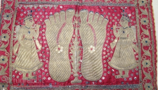 A Gujarat Silk Wall Hanging Puthia  Depicting the Feet of aJain Monk,  From Gujarat, India. Real Zari (Gold and Silver ) Embroidery on the Silk.

The presence of the holy teacher  ...