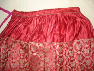 Khinkhab Ghaghra(Skirt),Real Zari Gold threads weaving on the silk,From Jamnagar,Gujarat, India. C.1900.The word Khinkhab, derived from the Persia,Mean's woven flower.Its size is 90cmX210cm. Good Condition(DSC06848).
        