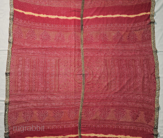  Ceremonial Badla Work (RealSilver) Tie and Dye Odhani known as Kumbhi,

Tie and Dye Work on the Gajji-Silk From Kutch Region of Gujarat, India.

c.1875-1900.

Its size is 120cmX165cm.

This were Traditionally used mainly by  ...