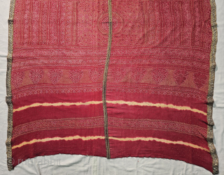  Ceremonial Badla Work (RealSilver) Tie and Dye Odhani known as Kumbhi,

Tie and Dye Work on the Gajji-Silk From Kutch Region of Gujarat, India.

c.1875-1900.

Its size is 120cmX165cm.

This were Traditionally used mainly by  ...