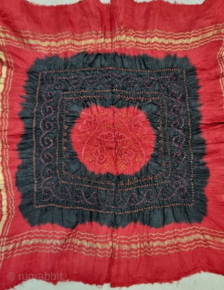 
Ceremonial Bandhani (Tie and Dye )
Rumal for the Groom, Tie and Dye Work on the Gajji-Silk With Real Zari Weaving Side Border, From Kutch Region of Gujarat, India.

C.1875-1900.

Its size is 35cmX35cm.

This was  ...