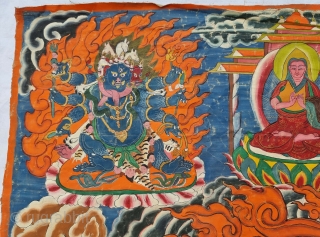 Thangka Shadbuja Mahakala From Tibet .
Distemper on cloth; recto with Tibetan inscriptions in gold identifying the various figures.

Shadbuja Mahakala is the principal protector deity of the Gelug school, indicated by the monks  ...