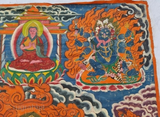 Thangka Shadbuja Mahakala From Tibet .
Distemper on cloth; recto with Tibetan inscriptions in gold identifying the various figures.

Shadbuja Mahakala is the principal protector deity of the Gelug school, indicated by the monks  ...