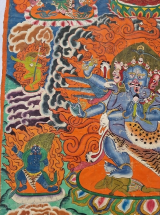 Thangka Shadbuja Mahakala From Tibet .
Distemper on cloth; recto with Tibetan inscriptions in gold identifying the various figures.

Shadbuja Mahakala is the principal protector deity of the Gelug school, indicated by the monks  ...